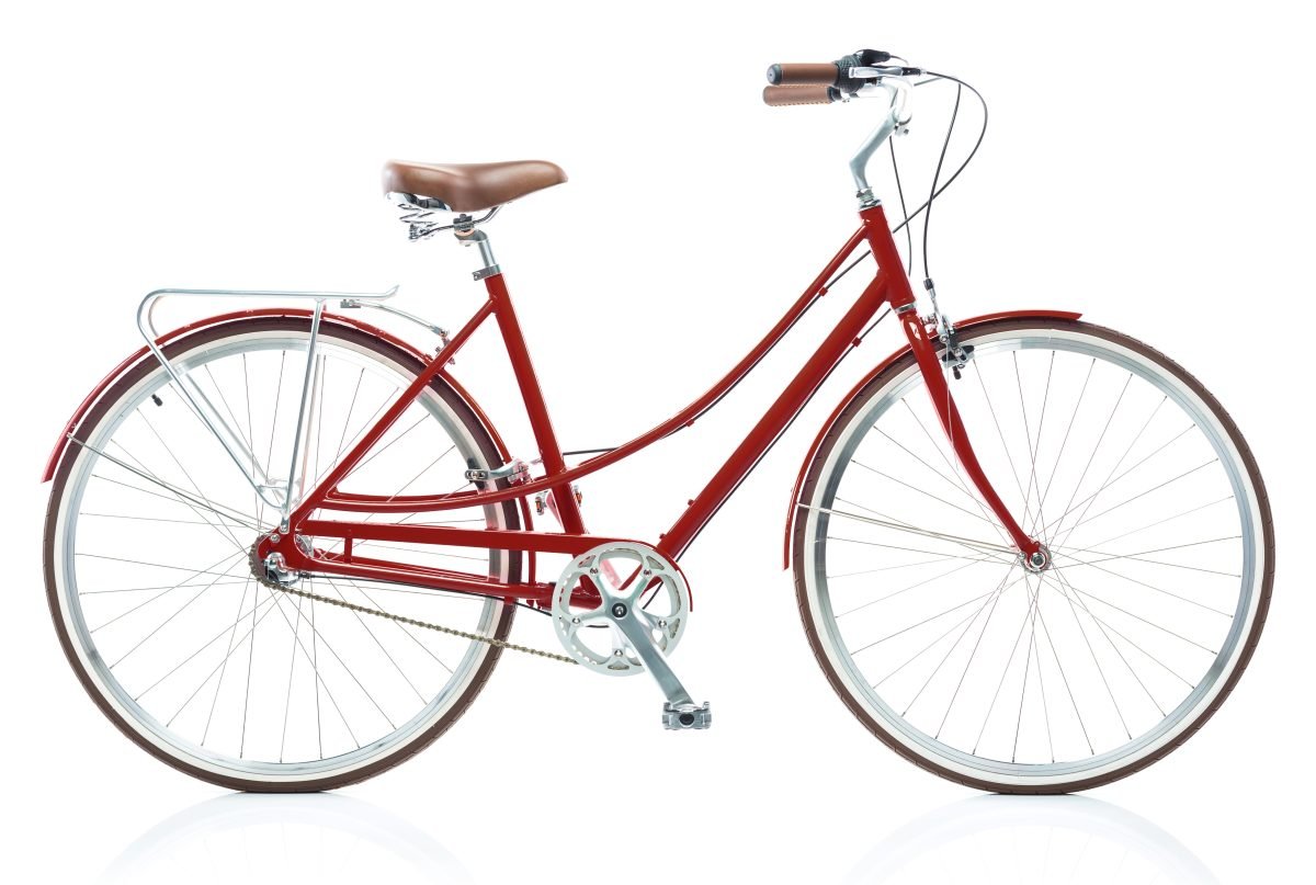 Stylish female red bicycle isolated on white